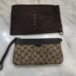 Gucci Beige and Black Monogram Clutch
